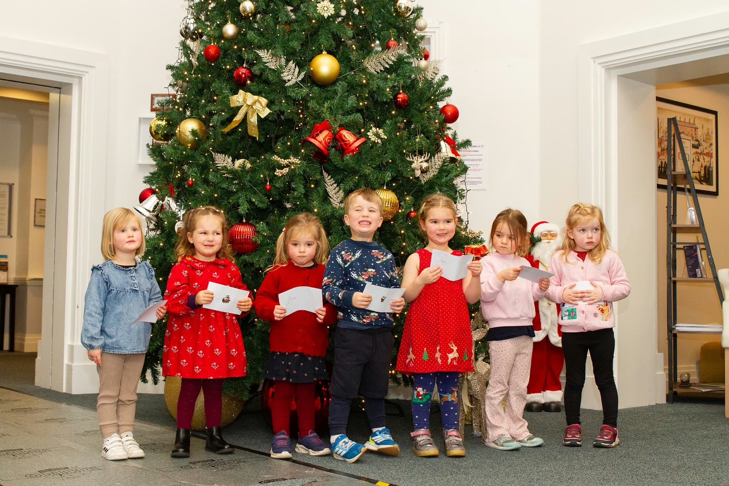 Carol Singing and Christmas Cheer Connect Young and Old in Altrincham